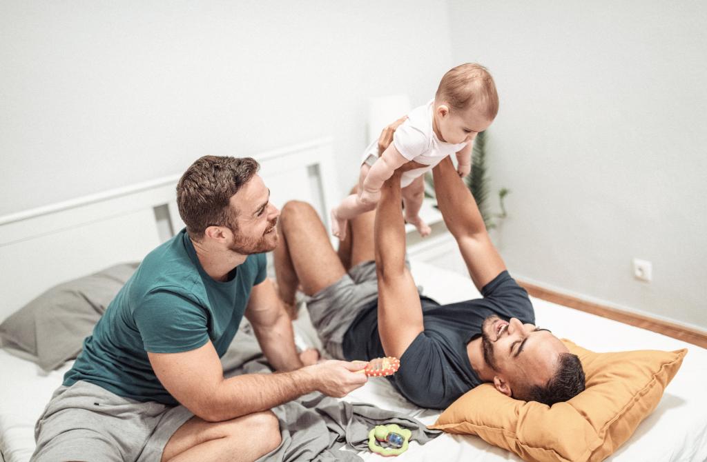 Dads playing with their baby