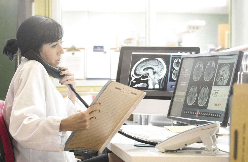 Doctor looking at MRI results.