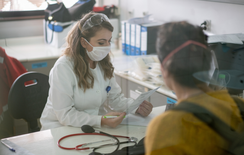 Doctor wearing mask in office
