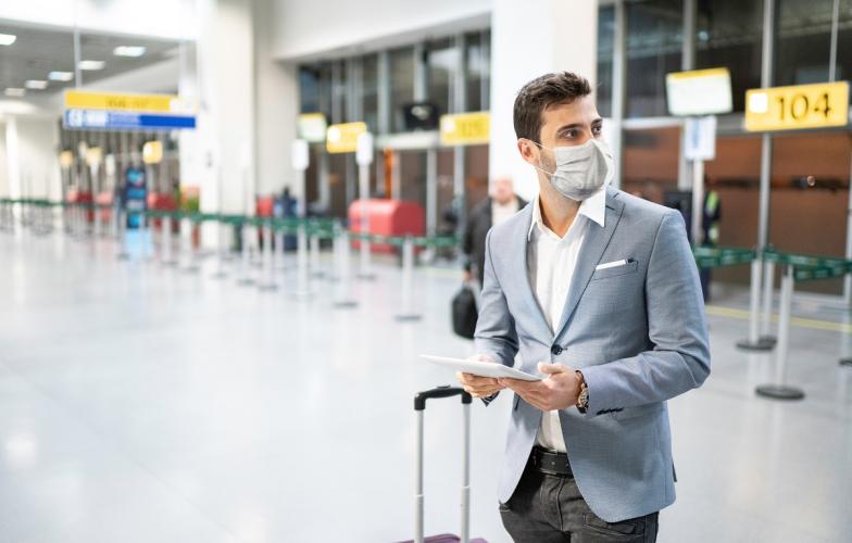 Man wearing mask at airport 