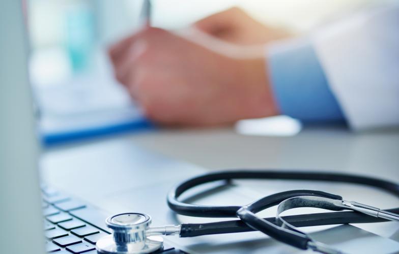 Physician with laptop