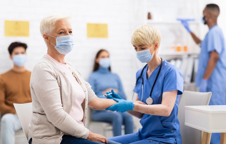 People receiving COVID19 vaccine at clinic 