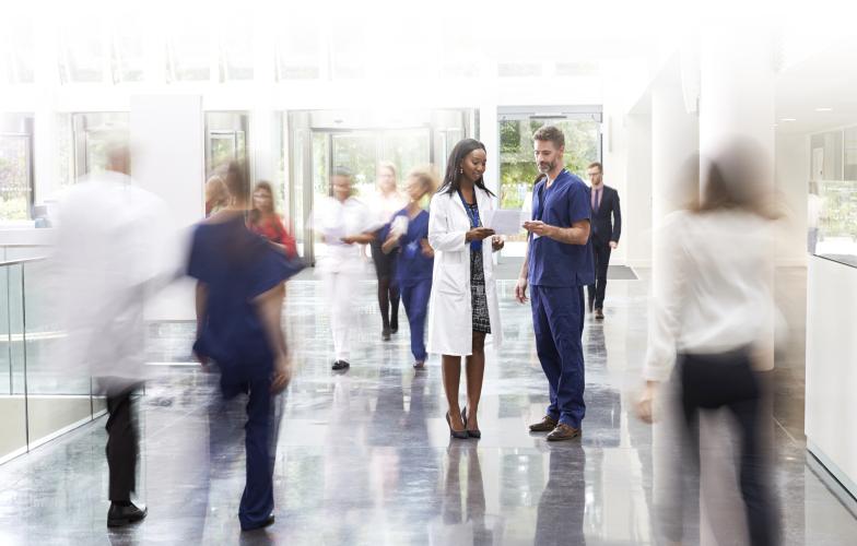 Health care workers speaking 