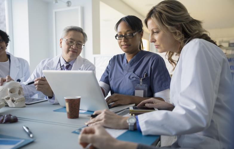group_of_physicians_doctors_in_meeting_gettyimages-603707559_id_313111.jpg