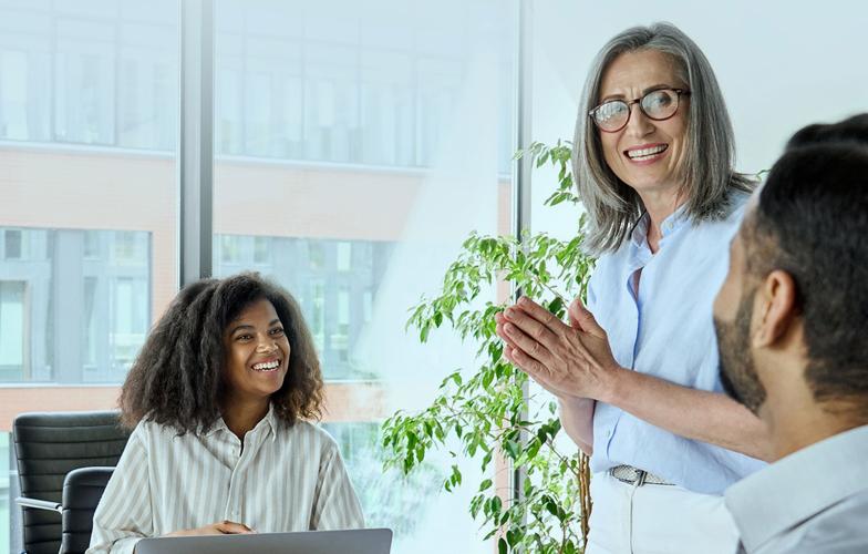 a group of health care workers engaging in a meeting
