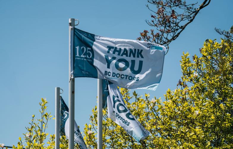 Custom flags flying to commemorate Doctors of BC's 125th annivesary and National Physicians Day