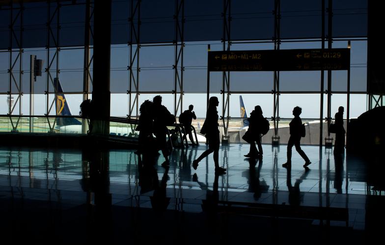Airport people travelling.