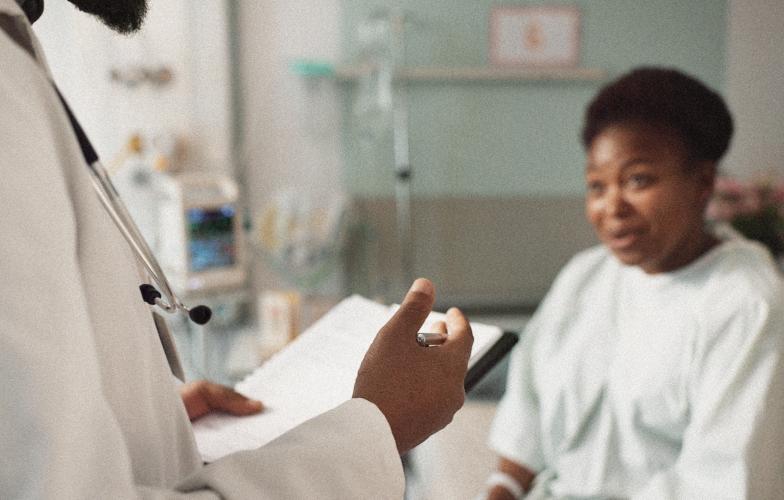 Doctor speaking with patient