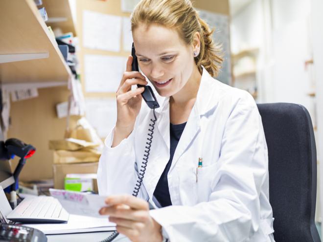 pharmacist talking on phone