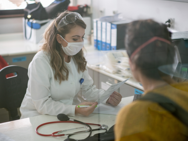Doctor wearing mask in office