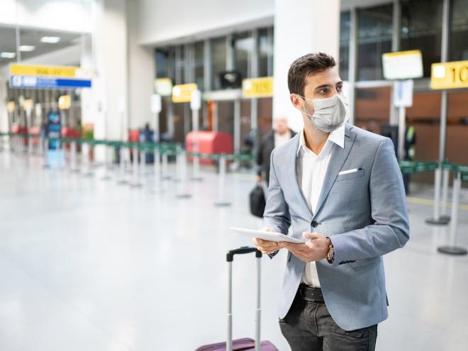 Man wearing mask at airport 