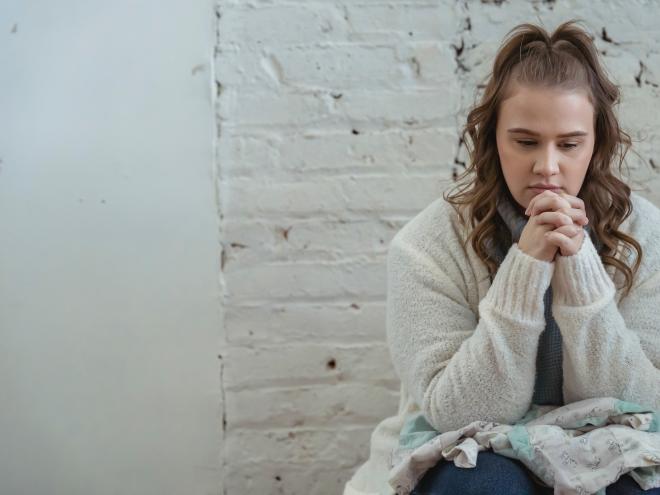 Young woman pondering 