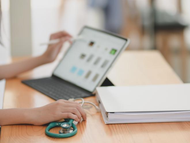 Doctor working on a laptop 