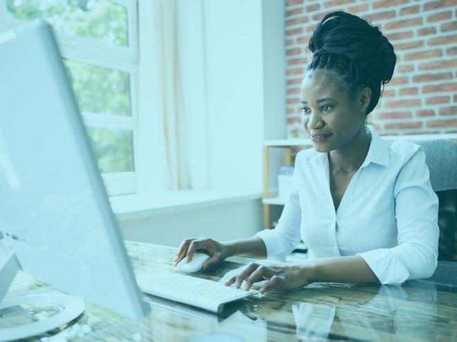 stock_woman_computer_black_smile_tint_1252883352.jpg