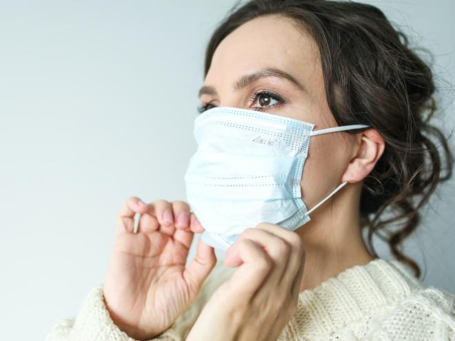 woman wearing a mask