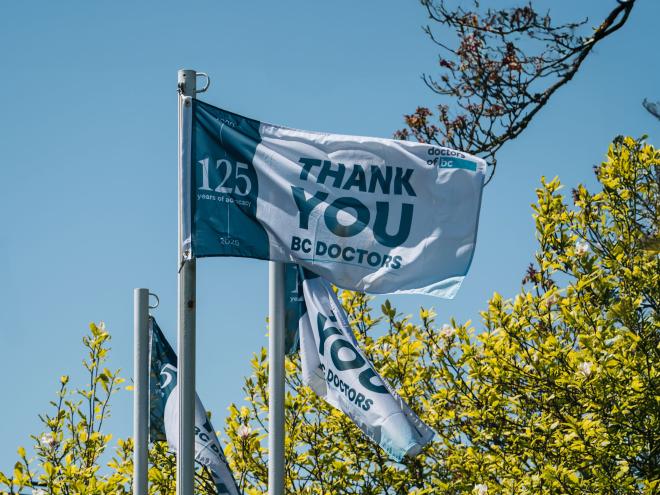 Custom flags flying to commemorate Doctors of BC's 125th annivesary and National Physicians Day