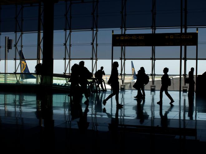 Airport people travelling.