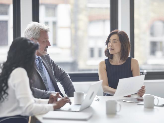 three_people_discussing_business_committee_istock_id_303845.jpg