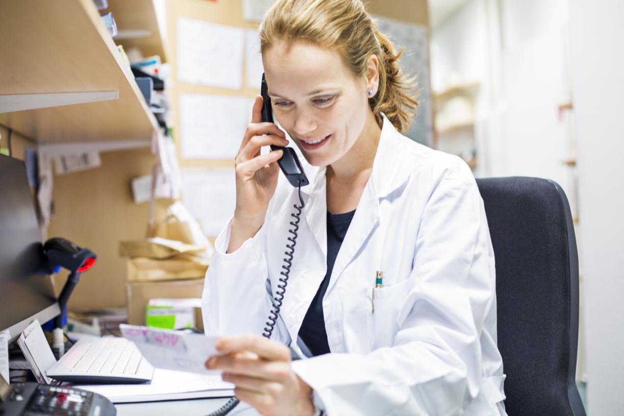 pharmacist talking on phone
