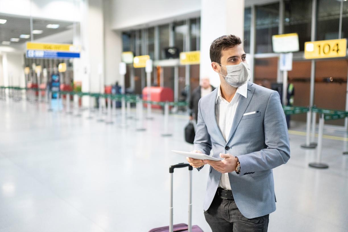 Man wearing mask at airport 