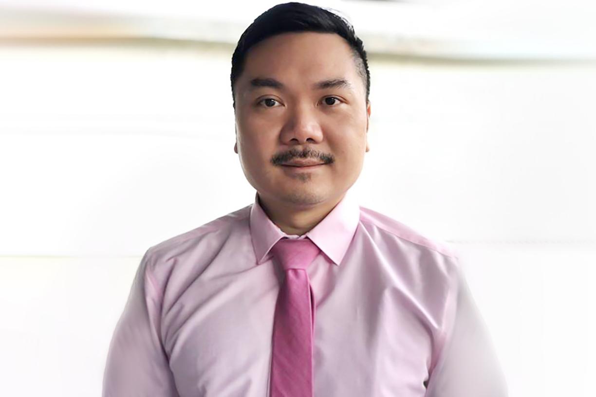 Dr Matthew Chow wearing pink for Pink Shirt Day 