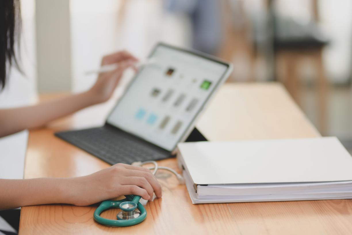 Doctor working on a laptop 