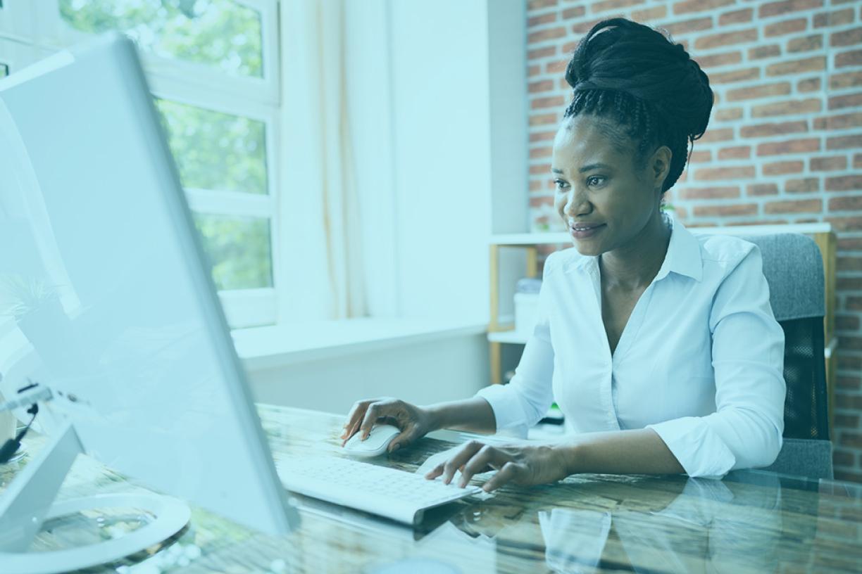stock_woman_computer_black_smile_tint_1252883352.jpg