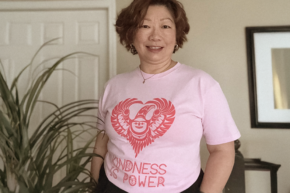 Dr Charlene Lui wearing pink shirt and smiling for Pink Shirt Day.