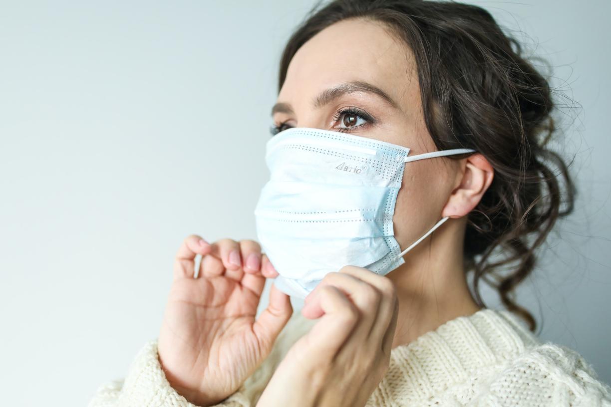 woman wearing a mask