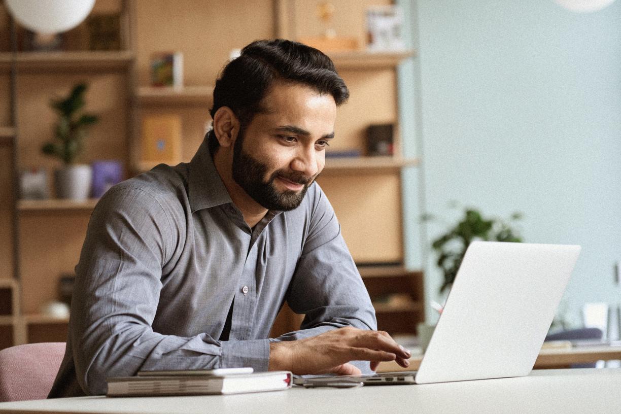 Person working on laptop.