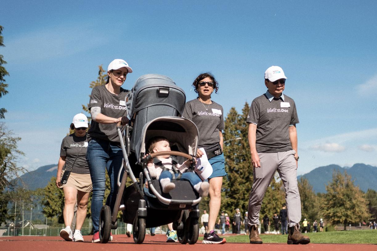 A group of people walking at Burnaby's Walk with your Doc event