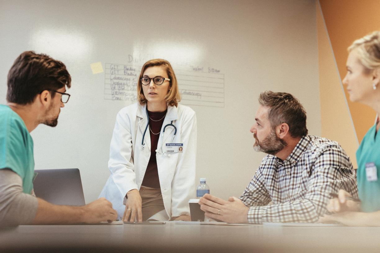 Medical team meeting at table