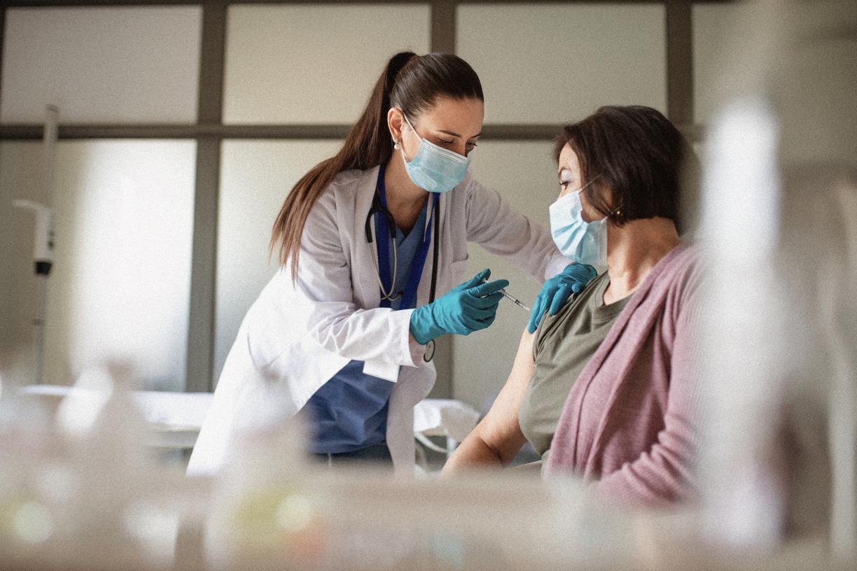 Doctor giving vaccine