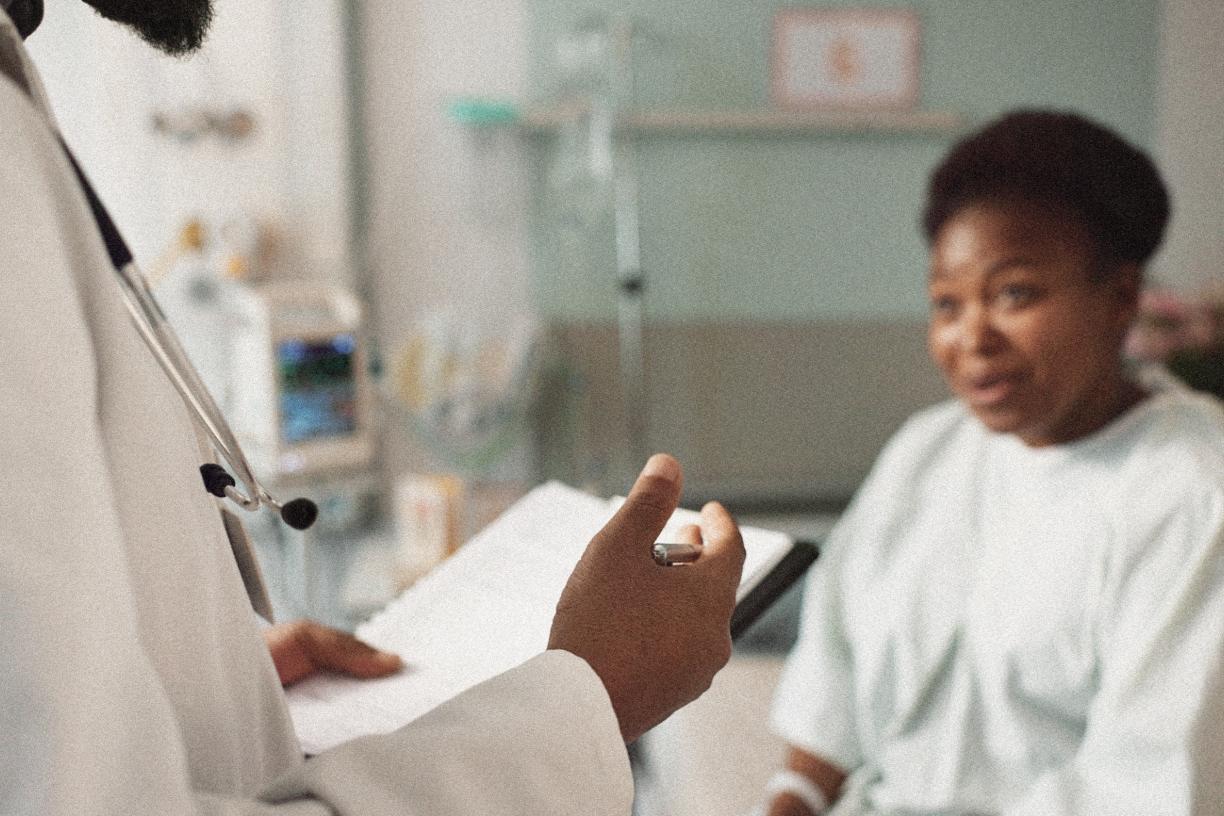 Doctor speaking with patient