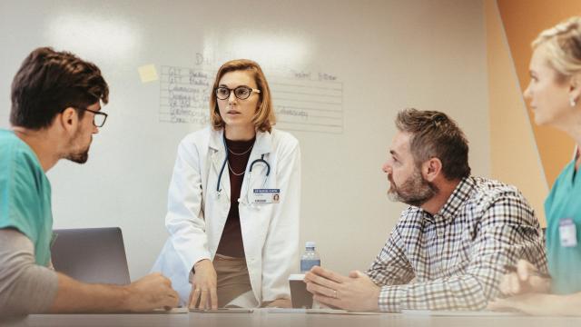 Medical team meeting at table