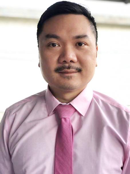 Dr%20Matthew%20Chow%20wearing%20pink%20for%20Pink%20Shirt%20Day