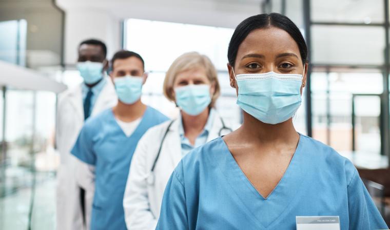Doctors%20standing%20together%20united%20 Doctors%20standing%20together%20united%20