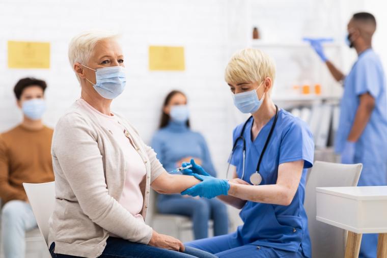 People%20receiving%20COVID19%20vaccine%20at%20clinic%20
