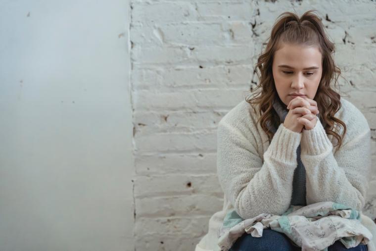 Young%20woman%20pondering%20 Young%20woman%20pondering%20